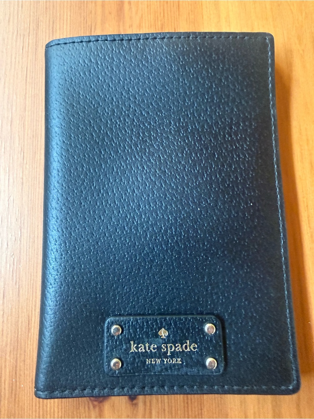 kate spade Black Pebbled Leather Passport and Card Wallet with Gold Logo Plate